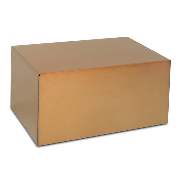 Wide low brass cremation urn, longer than it is tall, with a flat top and square edges