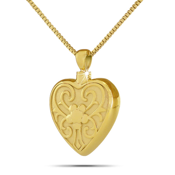 Gold-toned steel heart pendant with a raised flower across the front and a top opening