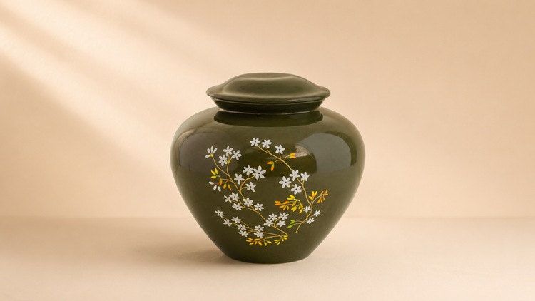 Hand-glazed ceramic cremation urn shown against a plain background for the collection banner