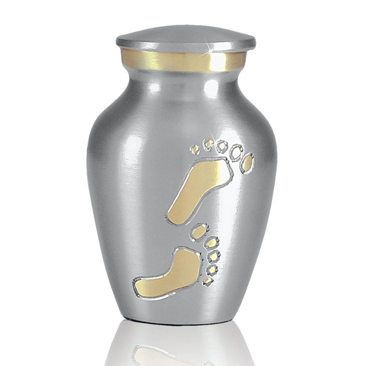 Small brass keepsake urn under three inches tall with a plain polished gold body