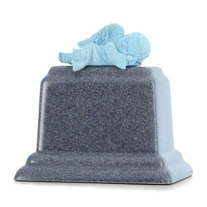 Small marble infant urn with pale veined stone and a softly rounded lid
