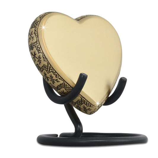 Matte brass maple leaf heart keepsake urn with a soft non-reflective surface