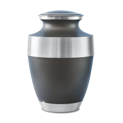 Brass cremation urn covered in leaf and vine work from the foot to the shoulder