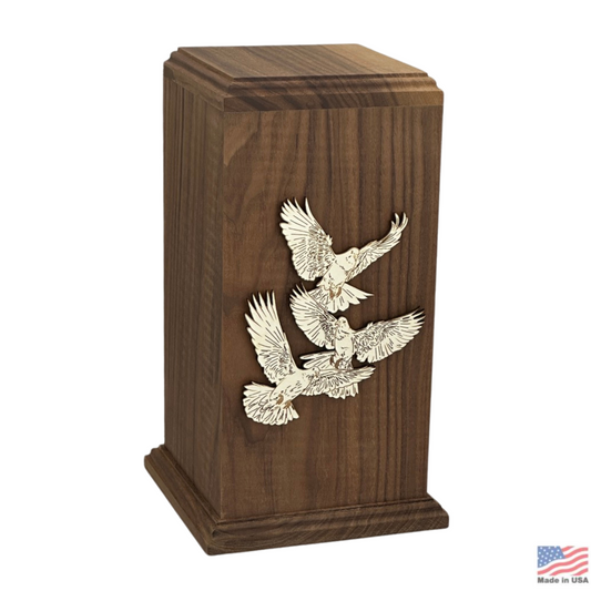 Tall dark walnut column urn carved with two doves in flight on the front face