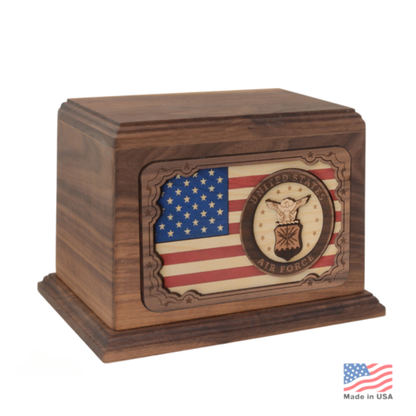 Wood cremation urn with a raised US Air Force emblem in relief on the front panel