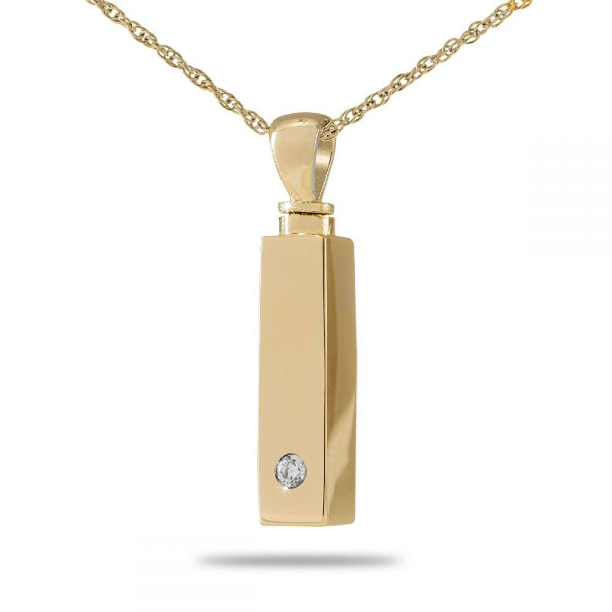 Slim gold-toned bar pendant set with a row of clear crystals, on a matching chain