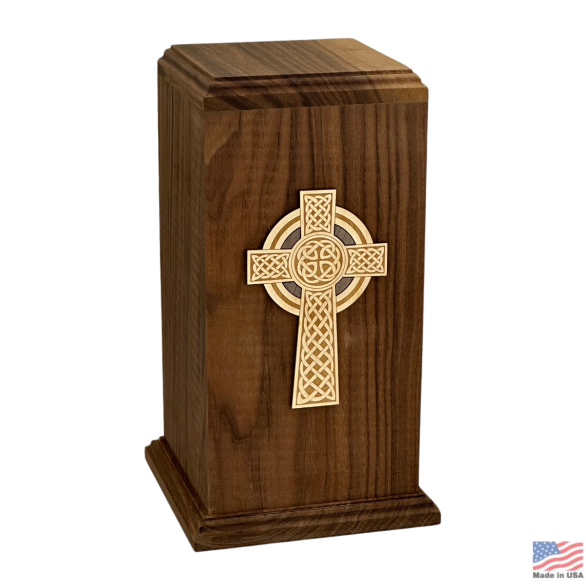 Walnut wood cremation urn with a detailed Celtic cross on the tall front panel