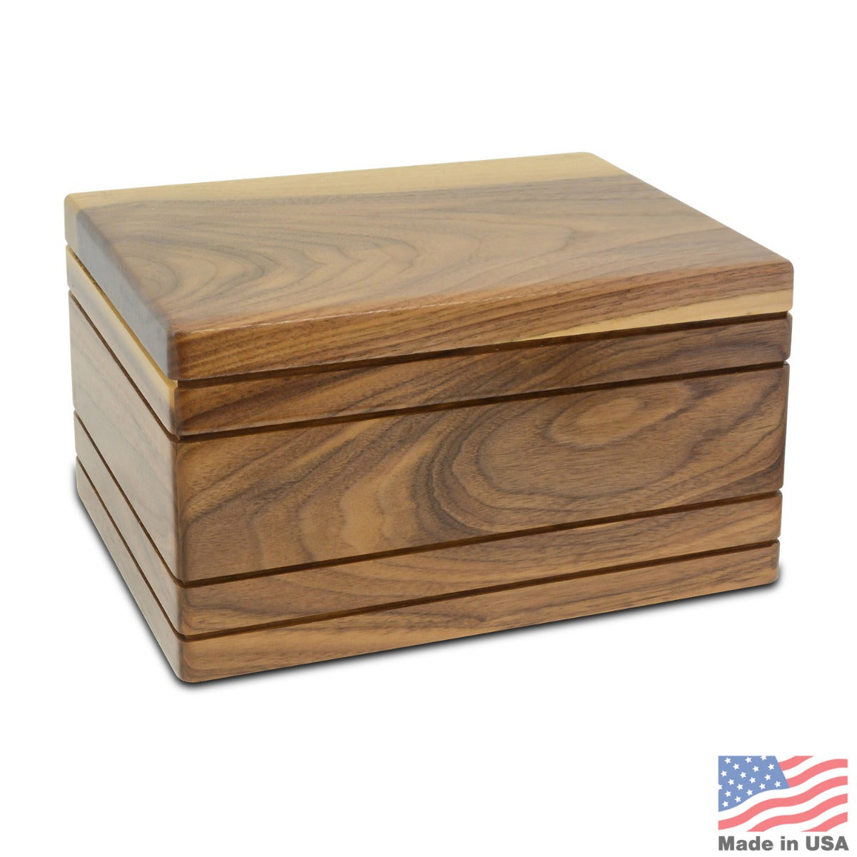 Low wide walnut cremation urn with a smooth plain front and dark grain