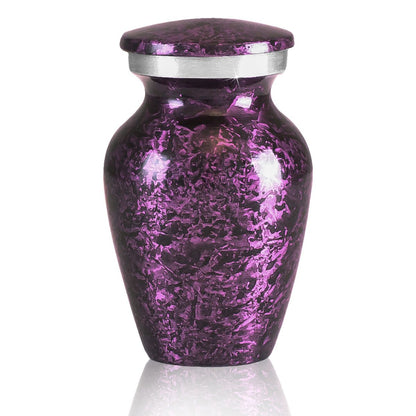 Keepsake urn with purple marbled coloring over a grey pewter finish and a rounded lid