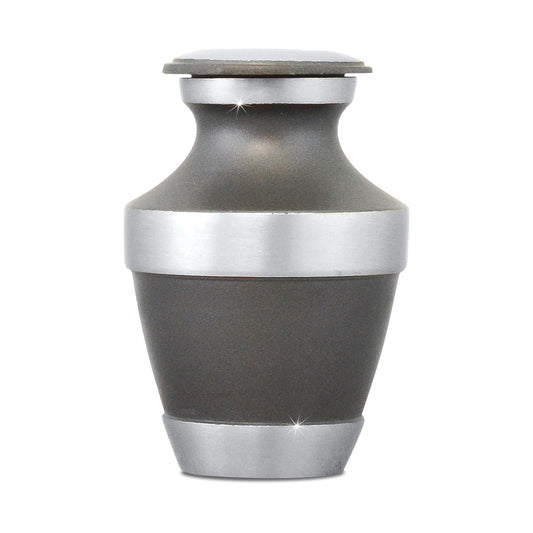 Small brass keepsake urn with a rounded polished body and a removable threaded top