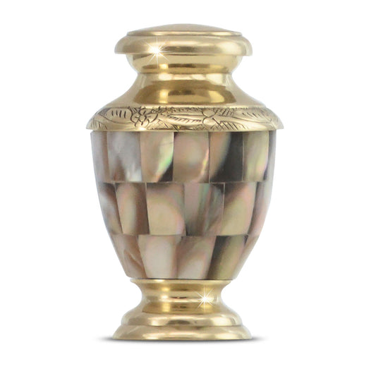 Brass keepsake urn with pale mother-of-pearl inlay panels and a rose on the front