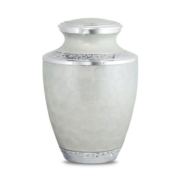 White brass cremation urn painted with a floral pattern around the body