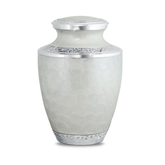 White brass cremation urn painted with a floral pattern around the body