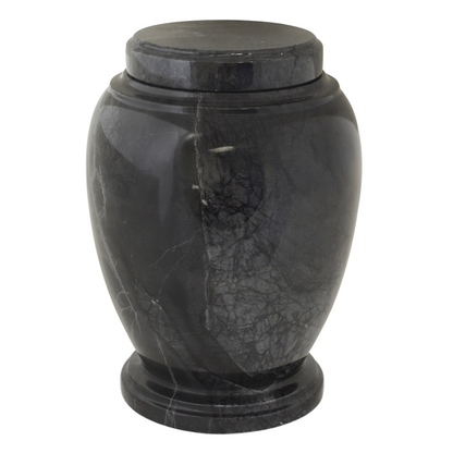 Contemporary black stone cremation urn with clean lines and an unmarked surface