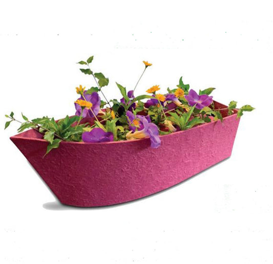 Long, low biodegradable water burial urn with a natural fiber finish, 17.5 inches end to end