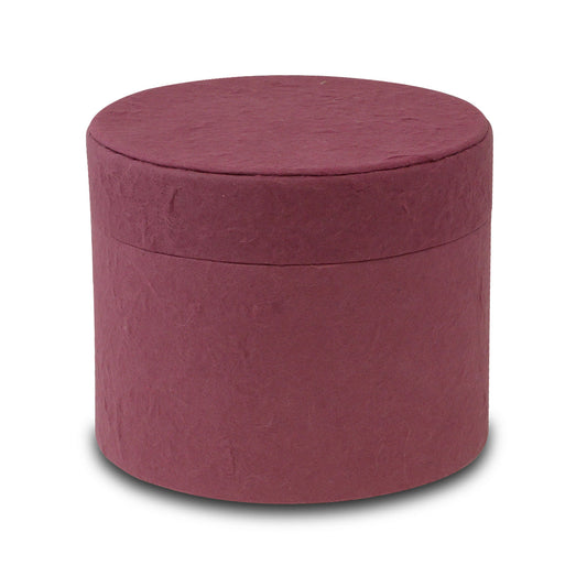 Short burgundy scattering tube, five inches across and four inches tall