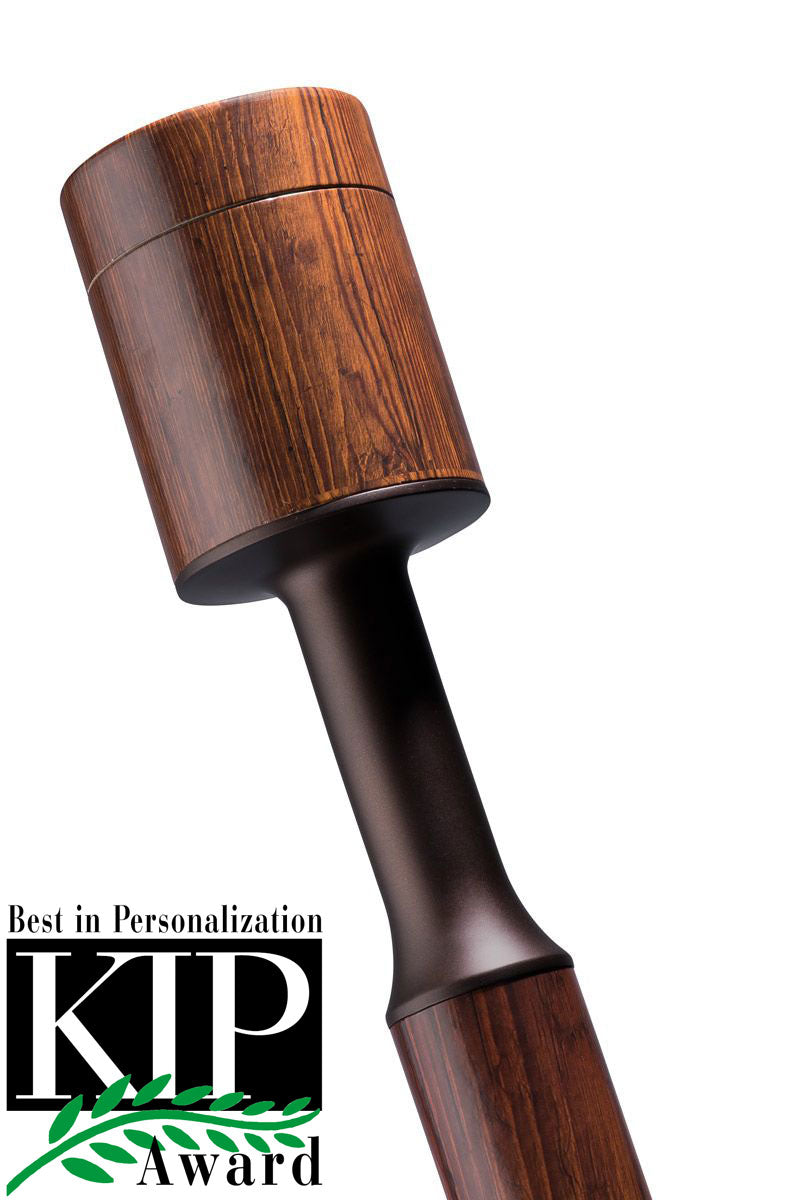 Plain brown oak cremation urn with a removable top lid and visible wood grain