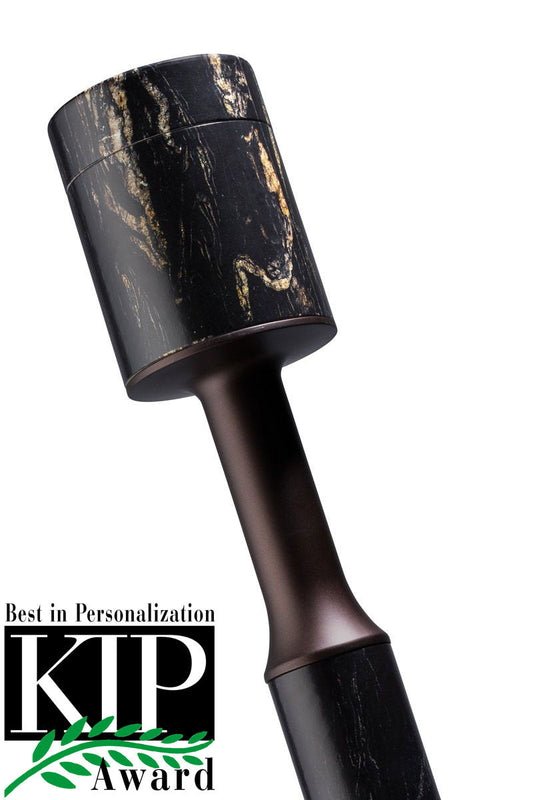 Black marble cremation urn with grey veining, a polished surface and a lift-off lid