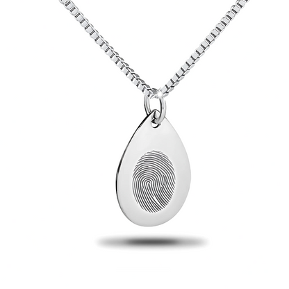 Flat silver teardrop pendant with a plain polished face on a chain