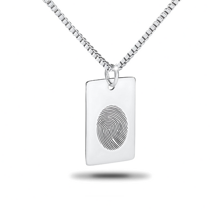 Dog tag shaped memorial pendant with a plain polished face, hung on a chain