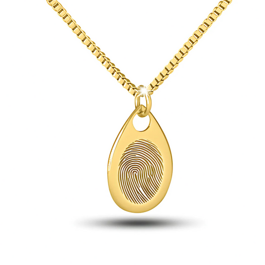 Slim silver teardrop pendant, about an inch tall, with a plain polished face