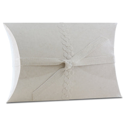 Wide shallow biodegradable urn in a pale pearl sand colour with a side seam