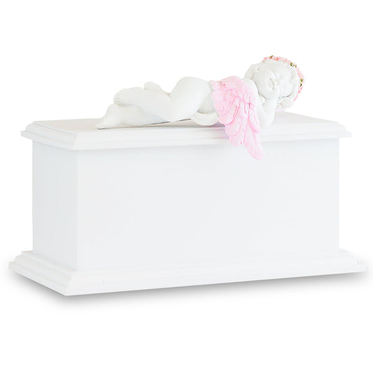 Pink wooden infant urn with a carved sleeping angel figure resting on the lid