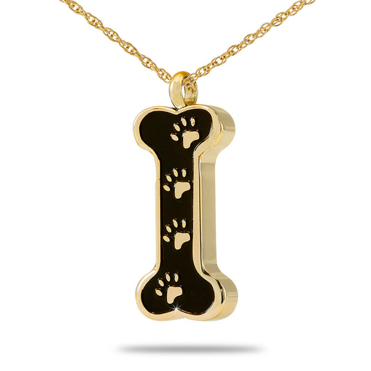 Gold-toned dog bone shaped pet keepsake pendant with a smooth polished surface