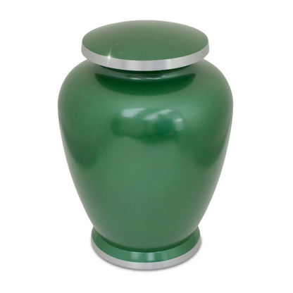 Tall aluminum cremation urn with a forest tree pattern worked around the body