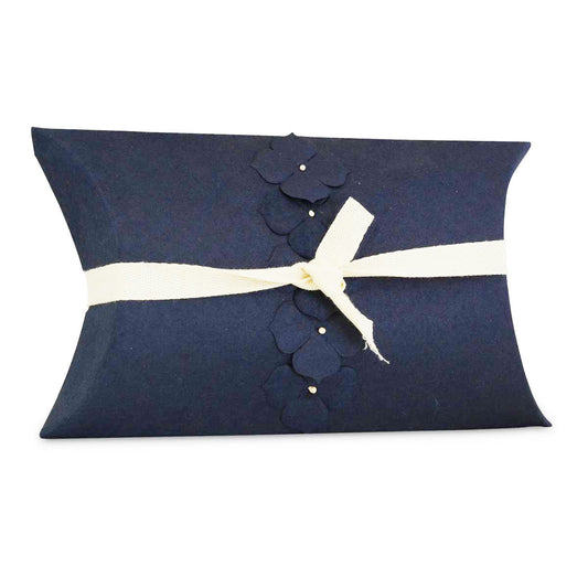 Small pearl-blue pressed paper water burial urn, six inches wide and two inches deep