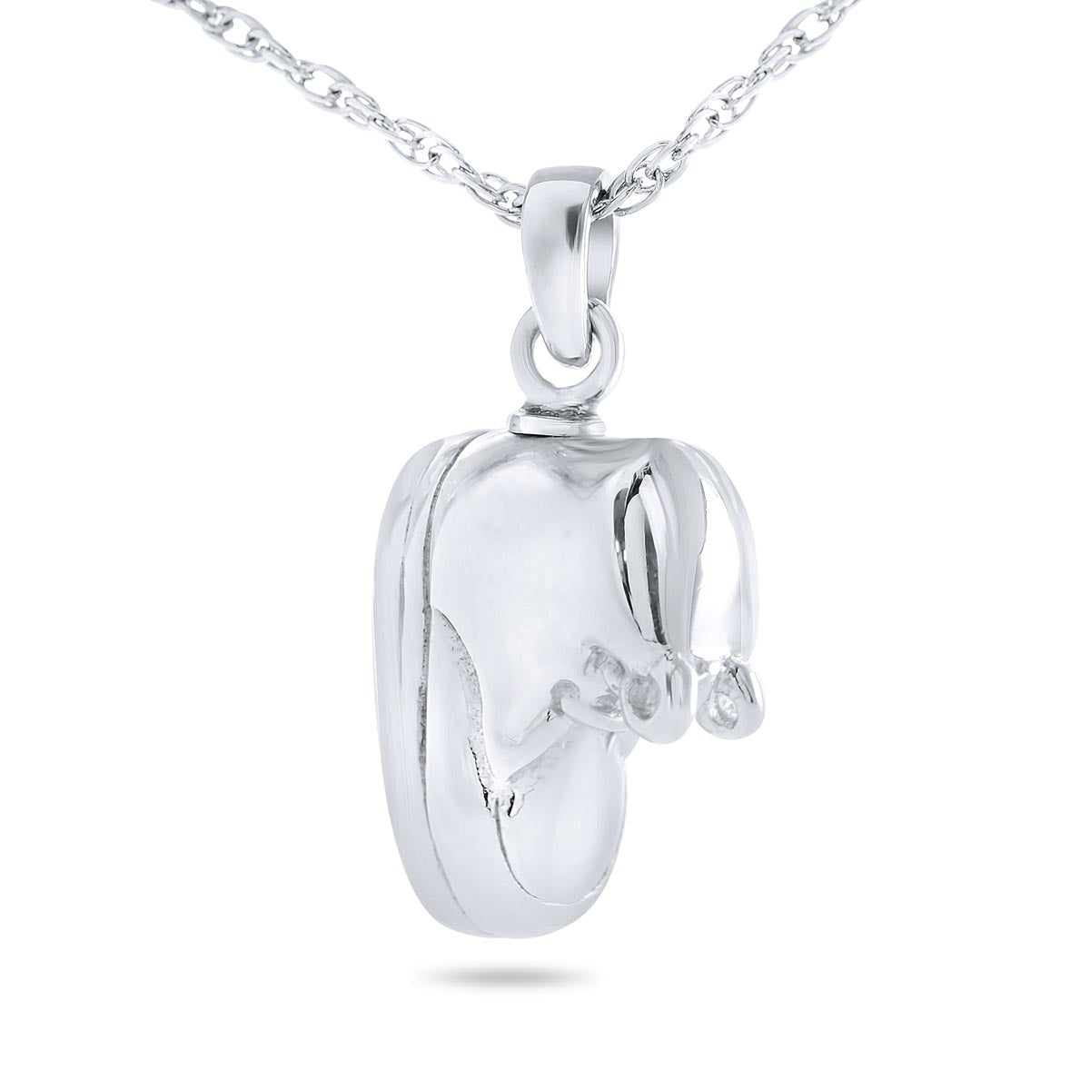 Small silver keepsake shaped like a baby bootie with a threaded opening at the top