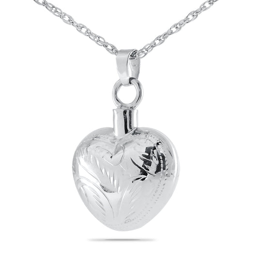 Small polished silver heart pendant, half an inch wide, on a fine silver chain