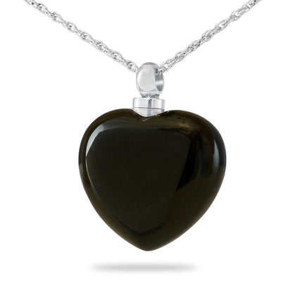 Stainless steel heart pendant with a glossy black glass face on a matching chain
