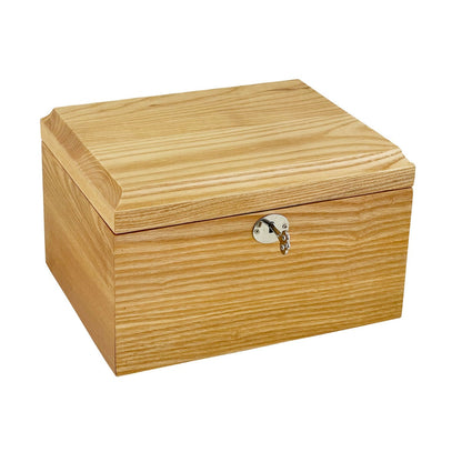 Light colored wooden cremation urn with a hinged lid and a small keyhole at the front
