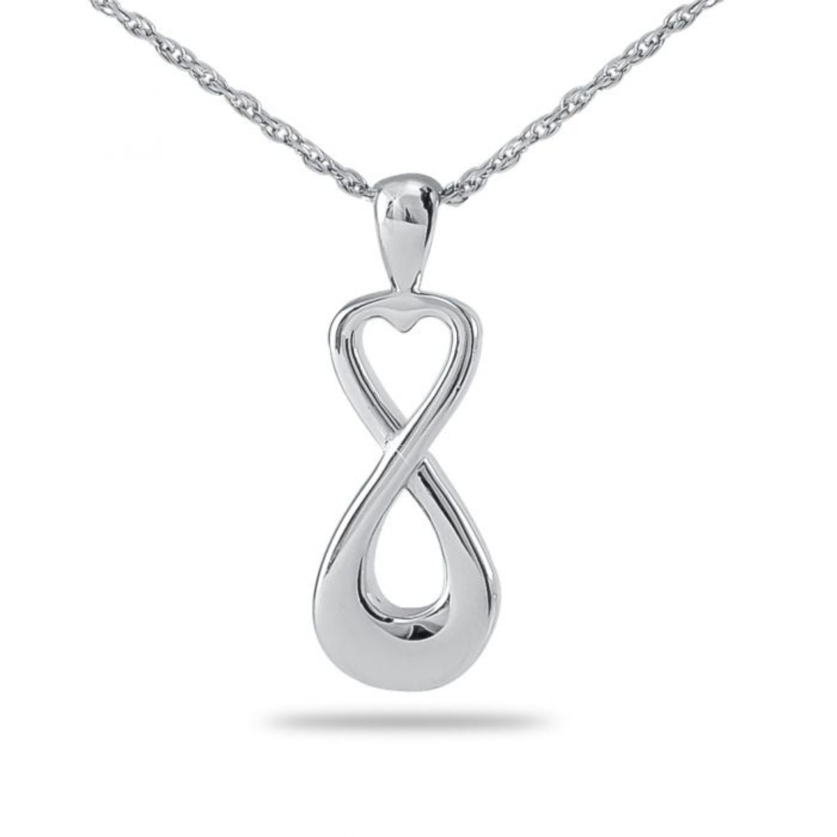 Silver heart pendant with a cut-out infinity loop across the front on a chain