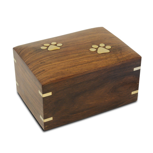 Large wooden pet urn with a paw print motif on the front panel