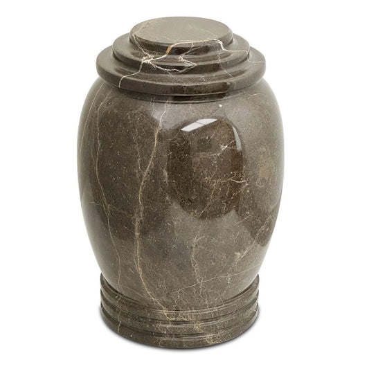 Rounded stone cremation urn in brown and tan tones with polished natural banding