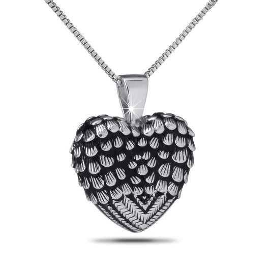 Silver pendant combining a feather, outspread wings, and a raised heart