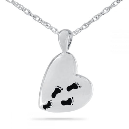 Silver pendant with a footprints motif and Footprints prayer lettering, on a silver chain