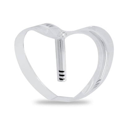 Glass heart keepsake with silver detailing, three and a half inches wide and an inch thick
