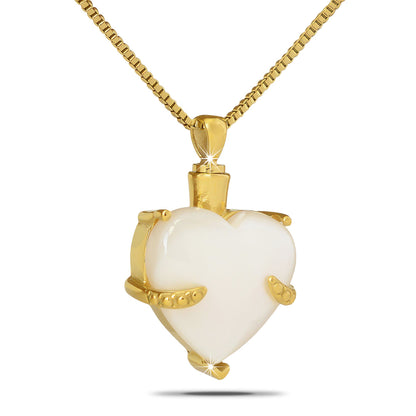 Small white marble heart set in a gold-toned steel frame on a fine chain
