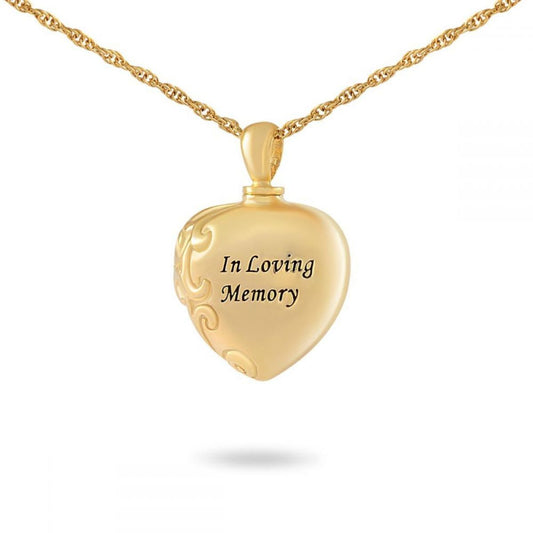Oval gold cremation pendant with a scripted memorial inscription across the front
