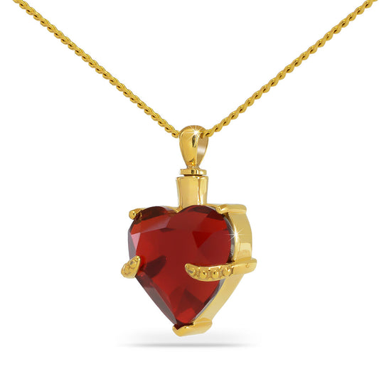 Gold heart cremation pendant with a red glass panel and screw top closure