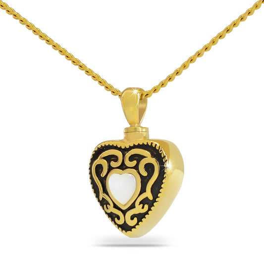 Gold plated steel heart pendant with a white enamel face and western style scrollwork
