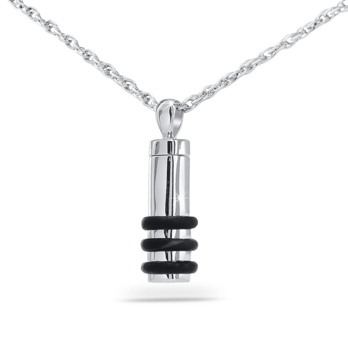 Slim silver cylinder cremation pendant banded with three raised rings, hanging vertically
