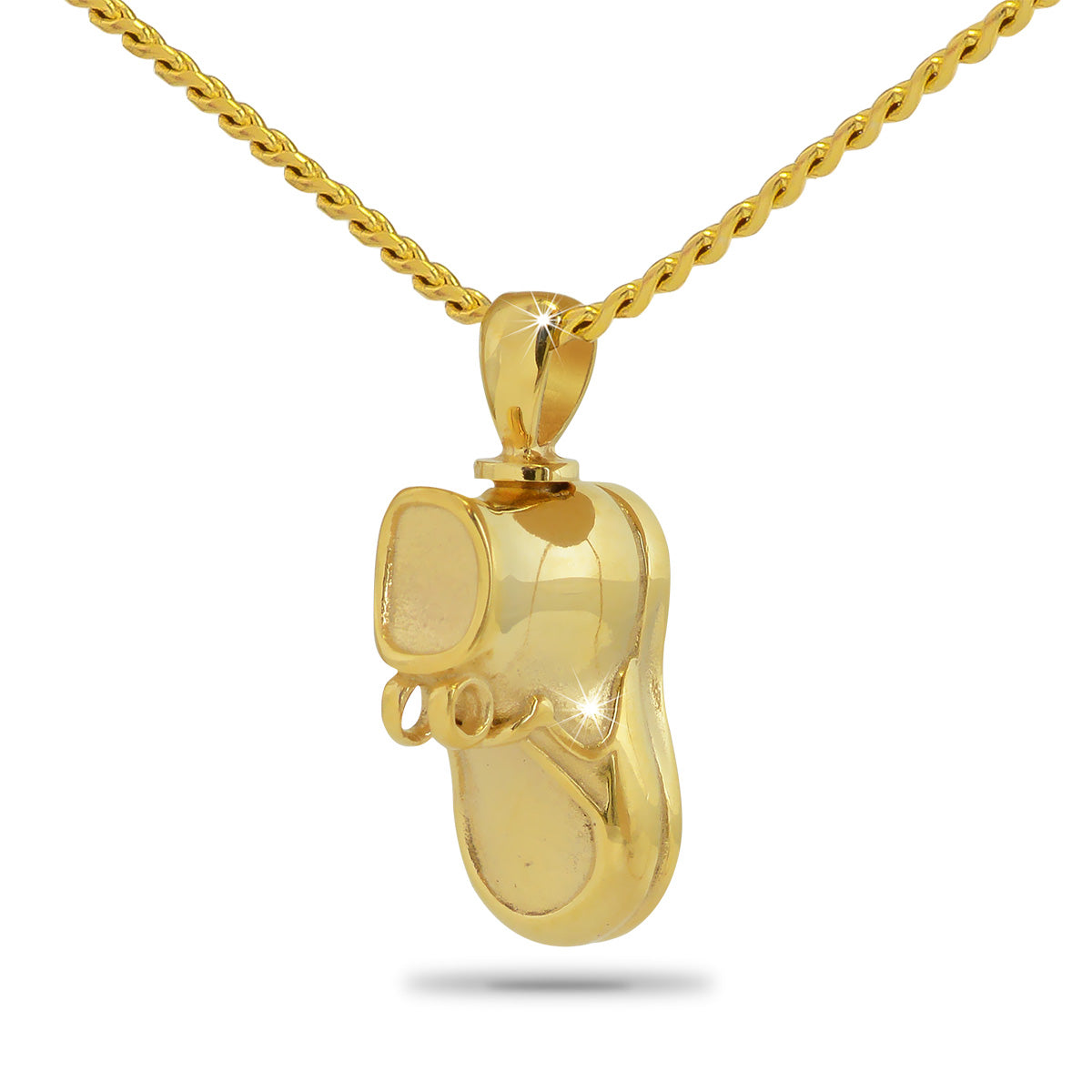 Tiny gold plated steel pendant shaped like a baby bootie with a small bow detail