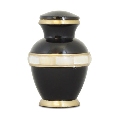 Small black urn with iridescent mother of pearl inlay panels set into a brass body