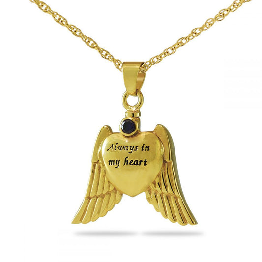 Gold wing-shaped cremation pendant set with a purple crystal, on a matching gold chain