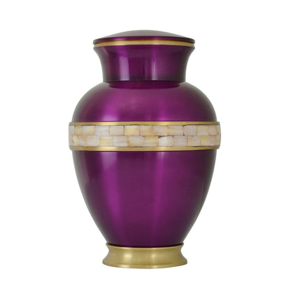 Brass cremation urn clad in purple mother of pearl with a matching lid and round body
