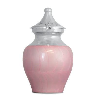 Small brass infant urn with a pale pink finish, narrow square body and a domed lid